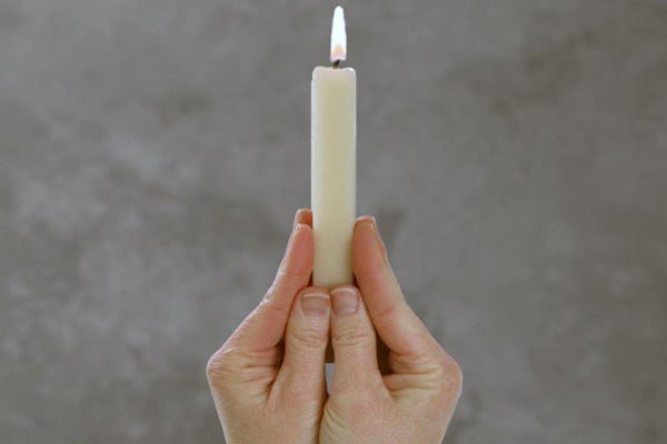 Simpatia da vela Lambida